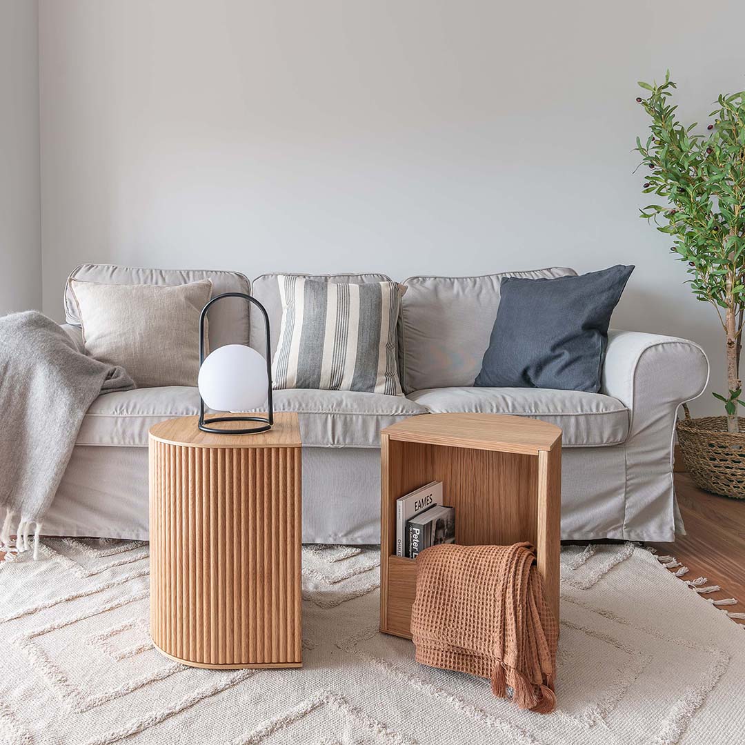 Two Duna oak side tables showing the fluted front and open storage