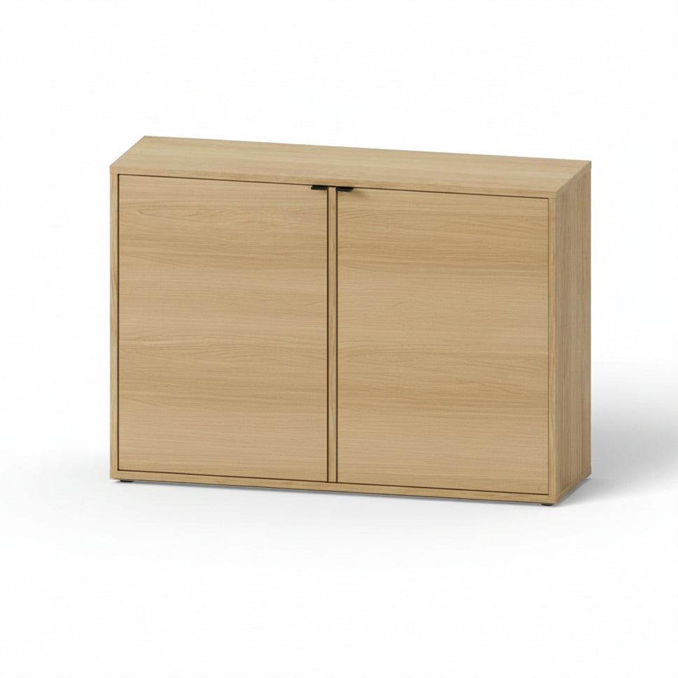 Pau two-door sideboard with smooth fronts and an oak-toned finish, viewed at an angle