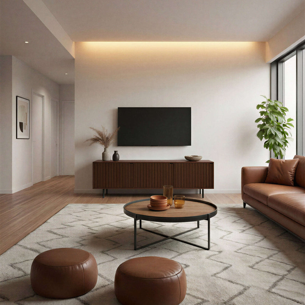 Pau TV unit with walnut-toned textured doors beneath a wall-mounted television in a living room