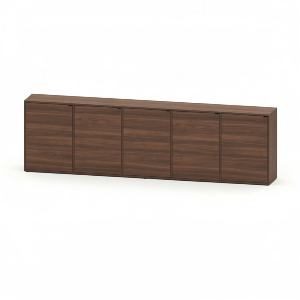 Pau five-door sideboard with smooth fronts and a walnut-toned finish, viewed at an angle