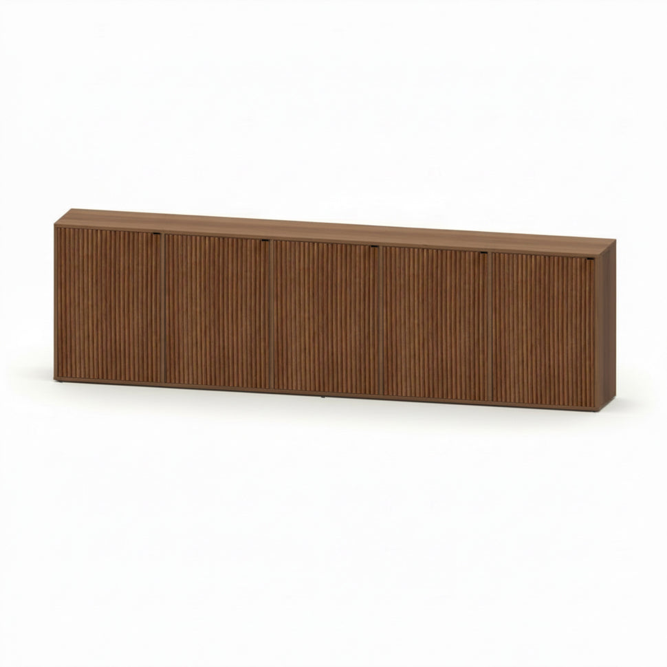 Pau five-door sideboard with textured fronts and a walnut-toned finish, viewed at an angle