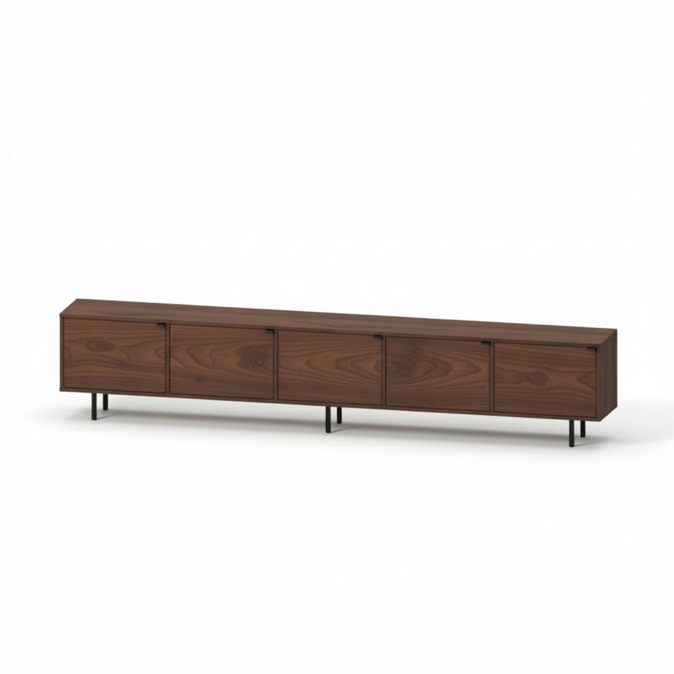 Pau five-door TV unit with smooth fronts and a walnut-toned finish, viewed at an angle