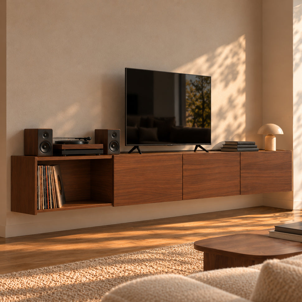 Four-module Dalea XL walnut-finish TV unit with one open compartment and three smooth-front drawers, viewed from an angle