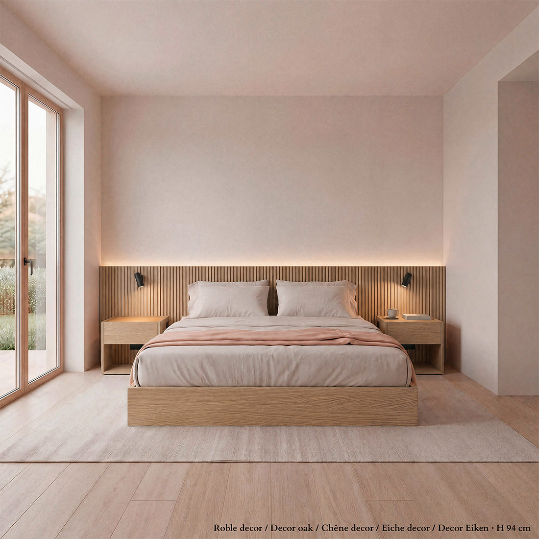 Natural oak Stoa headboard with floor-standing bedside tables in a bright bedroom
