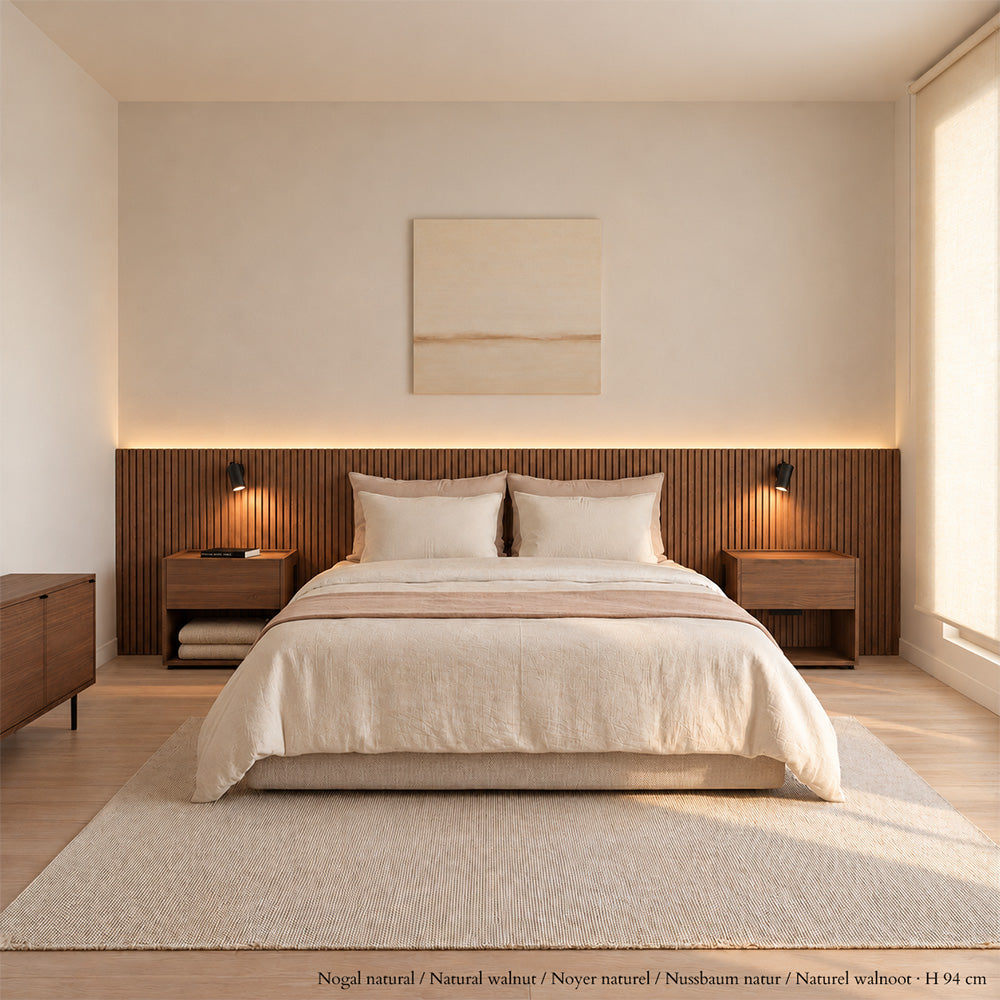 Natural walnut Stoa headboard with floor-standing bedside tables in a bedroom